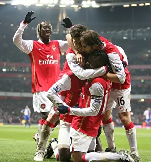 Emmauel Adebayor celebrates scoring the 2nd Arsenal goal with William Gallas