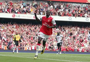 Emmauel Adebayor celebrates scoring Arsenals 2nd goal