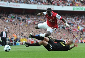 Arsenal v Liverpool 2010-2011 Collection: Emmauel Eboue (Arsenal) Martin Skrtel (Liverpool). Arsenal 1: 1 Liverpool