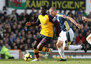 Cardiff City V Arsenal FA Cup Prints: Emmnauel Eboue (Arsenal) Gabor Gyepes (Cardiff City)