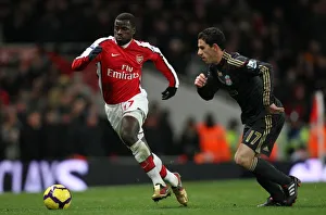 Arsenal v Liverpool 2009-10 Gallery: Emmnuel Eboue (Arsenal) Maxi Rodriguez (Liverpool). Arsenal 1: 0 Liverpool