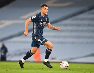 Empty Etihad: Xhaka's Intense Focus in Manchester City vs. Arsenal, 2020-21 Premier League