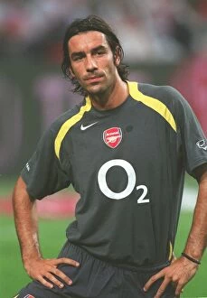 Robert Pires Collection: Euphoria Unleashed: Robert Pires Scores the Winning Goal for Arsenal at the 2005 Amsterdam