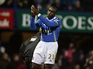 Portsmouth v Arsenal Gallery: Ex Arsenal player Sol Campbell salutes the arsenal fans during the match