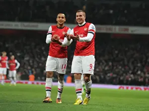 Arsenal V West Ham United 2012-13 Prints: The Exuberant Goal Celebration: Walcott and Podolski's Unforgettable Moment at Arsenal vs