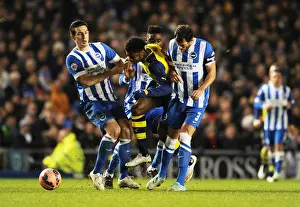 Brighton And Hove Albion V Arsenal - FA Cup 2014/15 Prints: FA Cup: Arsenal's Chuba Akpom Fouled by Brighton's Greer and Dunk