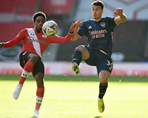 FA Cup Fourth Round: Southampton vs. Arsenal - Gabriel Martinelli's Battle with Walker-Peters Amid Empty Stands
