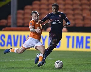 Images Dated 5th January 2019: FA Cup Third Round: Joe Willock vs Jay Spearing - Blackpool vs Arsenal