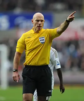 FA Cup Third Round: Swansea vs. Arsenal - Referee Howard Webb Overssees the Action
