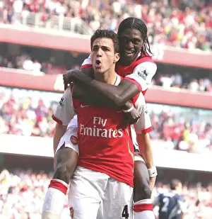 Fabregas and Adebayor: Arsenal's Unstoppable Duo Celebrate Goal Against Bolton Wanderers