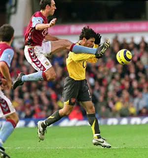 Fabregas vs McCann: A Battle of Midfield Maestros at Villa Park, 2005