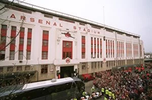 Fans gather outside the East Stand on Avenell Road to watch the Arsenal team entre the stadium