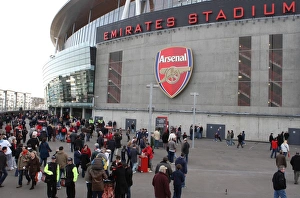 Fans gather outside the stadium