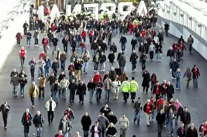 Images Dated 21st December 2006: Fans use the Clock End Bridge to get to the stadium