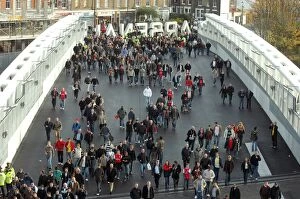 Fans Collection: Fans use the Clock End Bridge to get to the stadium