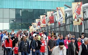 Arsenal v Liverpool 2010-2011 Collection: Fans use the Friar Bridge. Arsenal 1: 1 Liverpool. Barclays Premier League