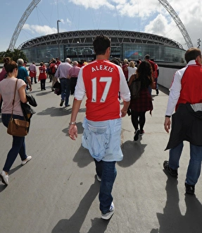 Arsenal V Manchester City - FA Community Shield 2014/15 Prints: Fans walk to the stadium before the match