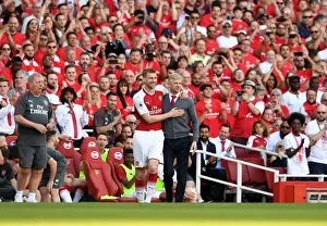 Arsenal V Burnley 2017-18 Prints: A Farewell Embrace: Mertesacker and Wenger's Last Moment at Arsenal (2017-18)