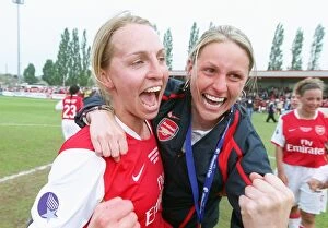 Faye White and Kelly Smith (Arsenal) celebrate at the end of the match