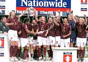 Images Dated 2nd May 2006: Faye White lifts the FA Cup Trophy for the Arsenal Ladies