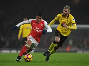 Arsenal V Watford 2016-17 Prints: Fierce Rivalry: Sanchez vs. Behrami Clash in Arsenal vs. Watford Showdown