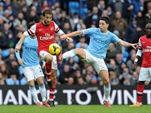 Manchester City Collection: Flamini and Nasri Clash: Manchester City vs. Arsenal, Premier League 2013-14