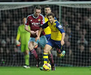 West Ham United V Arsenal 2014-15 Prints: Flamini Surges Past Nolan: Intense Moment from West Ham vs. Arsenal (2014-15)
