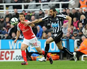 Newcastle United V Arseal 2014/15 Prints: Flamini vs. Gutierrez: Intense Battle in Newcastle United vs. Arsenal Premier League Clash