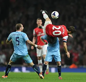 Flamini vs. Silva: A Battle of Midfield Masters at Arsenal vs. Manchester City (2013/14)