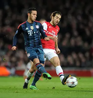 Arsenal V Bayern Munich 2013-14 Prints: Flamini vs. Thiago: Battle in the Midfield - Arsenal v FC Bayern Munich