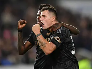 Fourth Goal Celebration: Xhaka and Partey Rejoice in Arsenal's Victory over Brighton (December 2022)