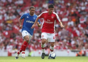 Arsenal v Portsmouth 2009-10 Collection: Fran Merida (Arsenal) Hayden Mullins (Portsmouth)