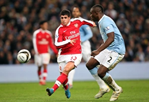 Manchester City v Arsenal - Carling Cup 2009-10 Collection: Fran Merida (Arsenal) Micah Richards (Man City). Manchester City 3: 0 Arsenal