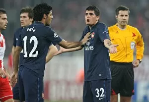 Images Dated 9th December 2009: Fran Merida and Carlos Vela (Arsenal). Olympiacos 1: 0 Arsenal, UEFA Champions League