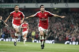 Arsenal v Liverpool - Carling Cup 2009-10 Collection: Fran Merida and Craig Eastmond: Celebrating Arsenal's First Goal Against Liverpool in Carling Cup