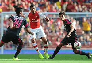 Francis Coquelin (Arsenal) Andre Almeida and Candeias (Benfica). Arsenal 5: 1 Benfica