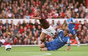 Freddie Ljungberg (Arsenal) is fouled by Kenny Cunningham (Birmingham) leading to Cunnigham being se