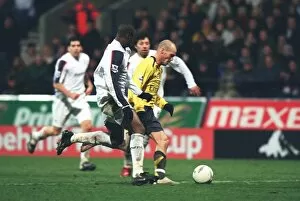 Ljungberg Freddie Collection: Freddie Ljungberg breaks past Bolton defender Abdoulaye Meite to score the 2nd Arsenal goal