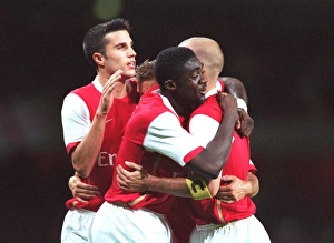 Arsenal v Dinamo Zagreb Collection: Freddie Ljungberg is congratulated on scoring Arsenal s