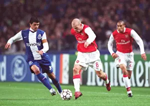 Freddie Ljungberg and Gael Clichy (Arsenal) Lucho Gonzalez (Porto)