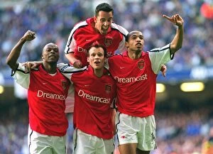 Images Dated 7th April 2005: Fredrik Ljungberg celebrates scoring the 2nd Arsenal goal with Thierry Henry