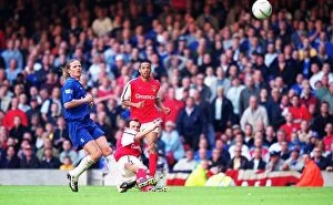 Arsenal v Chelsea FA Cup Final Collection: Fredrik Ljungberg shoots past Chelsea goalkeeper Carlo Cudicini to score the 2nd Arsenal goal as Emm