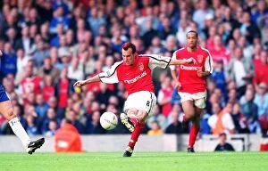 Arsenal v Chelsea FA Cup Final Collection: Fredrik Ljungberg shoots past Chelsea goalkeeper Carlo Cudicini to score the 2nd Arsenal goal