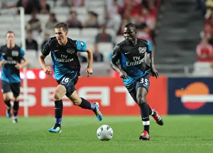 Frimpong and Ramsey: Arsenal's Midfield Duo Shine in Pre-Season Friendly Against Benfica (2011)