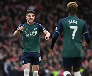 Fulham V Arsenal 2023-24 Prints: Fulham vs. Arsenal: Bukayo Saka and Declan Rice Exchange Instructions in 2023-24 Premier League Clash