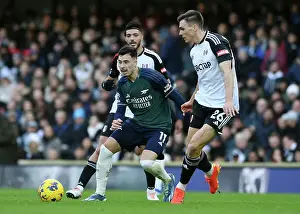 Fulham vs. Arsenal: Martinelli Fights for Possession in Intense Premier League Clash (2023-24)