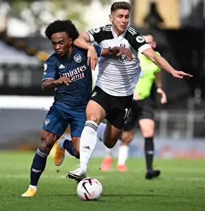 Images Dated 12th September 2020: Fulham vs. Arsenal: Willian Fouled by Tom Cairney in 2020-21 Premier League Clash