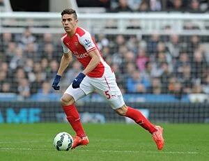 Images Dated 25th February 2009: Gabriel in Action: Newcastle United vs. Arsenal, Premier League 2014/15