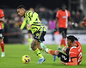 Gabriel Jesus Faces Off Against Luton Town's Gabriel Osho: Intense Action from the Arsenal vs. Luton Premier League Match (2023-24)