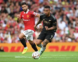 Manchester United V Arsenal 2022-23 Prints: Gabriel Jesus Outmaneuvers Bruno Fernandes: A Premier League Clash Between Manchester United and Arsenal